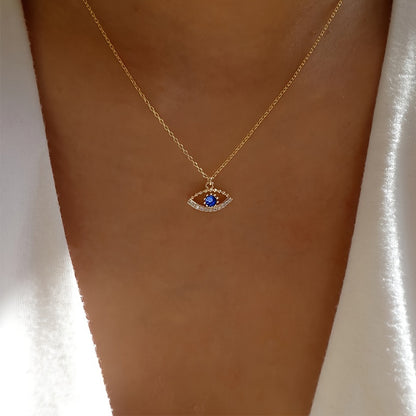 Collier Œil Bleu Doré — Mauvais Œil Protecteur & Reflets Mystiques
