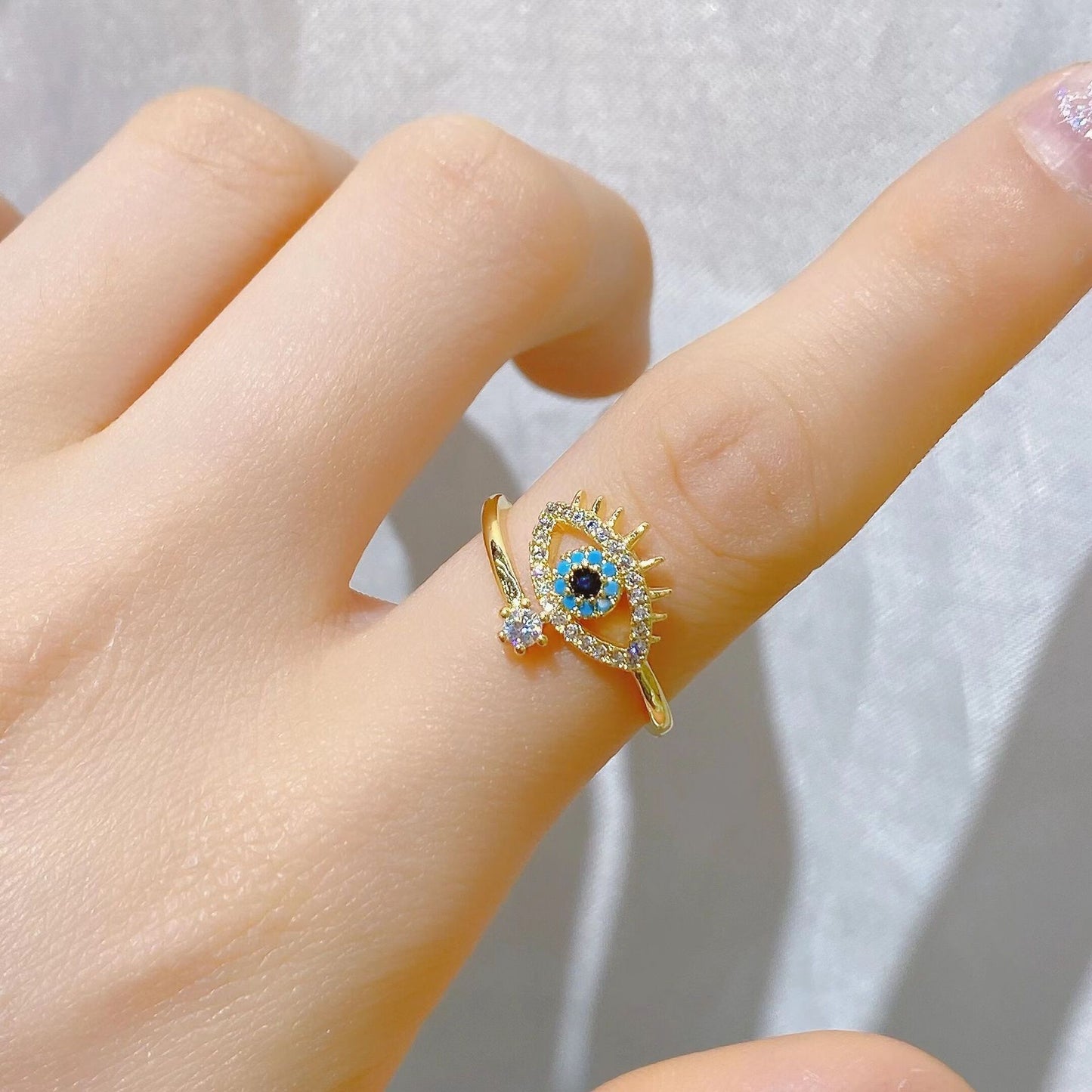 Bague Protectrice Dorée — Œil Turquoise et Éclat Cristallin