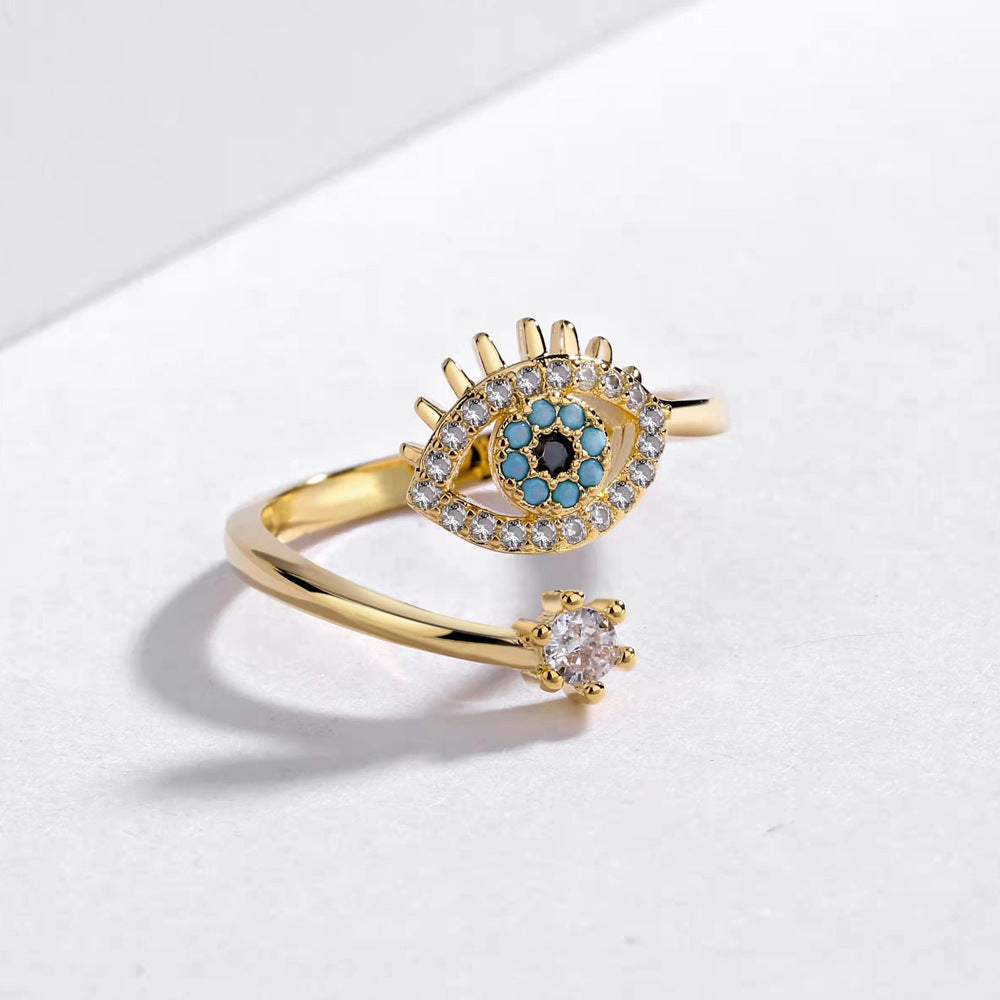 Bague Protectrice Dorée — Œil Turquoise et Éclat Cristallin